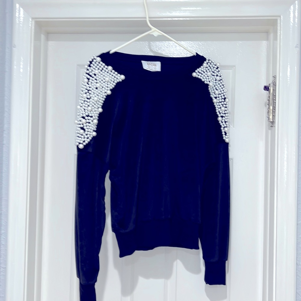 Womans black velour long sleeve top with beautiful pearls on both shoulders